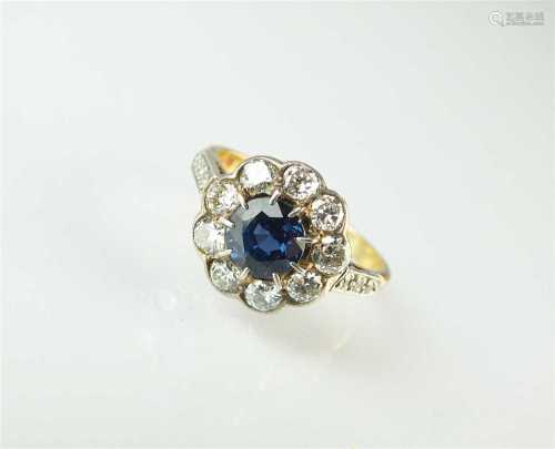 A sapphire and diamond floral cluster ring