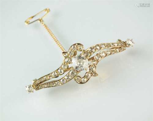 A diamond bar brooch