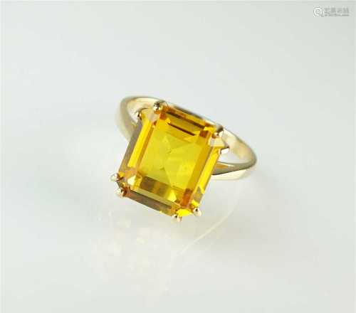 A yellow sapphire ring