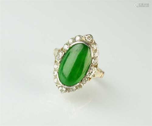 A jade and diamond cluster ring