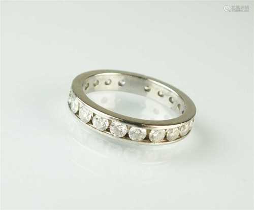 An 18ct white gold diamond full eternity ring