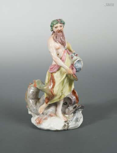 A Bow figure of Neptune, circa 1755, modelled standing holding a jar issuing water with a dolphin by