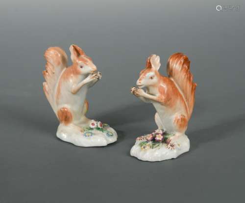 A rare pair of Derby Patch Mark models of red squirrels, circa 1765-70, naturalistically modelled on