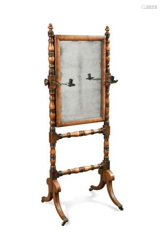 A Regency mahogany cheval dressing mirror, on ring turned supports with brass candle holders 140 x