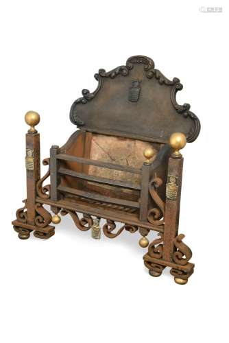 A mid-18th century cast iron and brass basket fire grate, with shaped back and applied crests 91 x