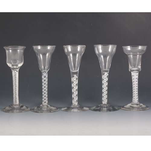 A George III style wine glass, together with four other glasses