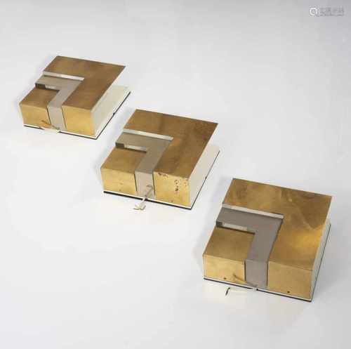 Italy, Three wall lights, 1970sThree wall lights, 1970sH. 26 x 25.5 x 10 cm. Sheet brass, part