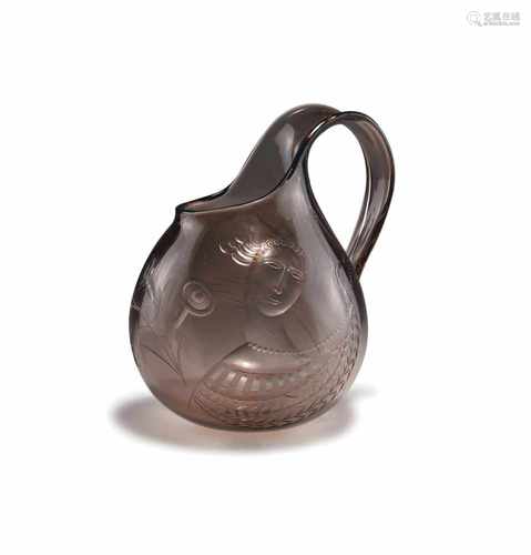 Franz Pelzel, Jug, 1930sJug, 1930sH. 20.3 cm. Made by S.A.L.I.R. Pale purple glass, engraved