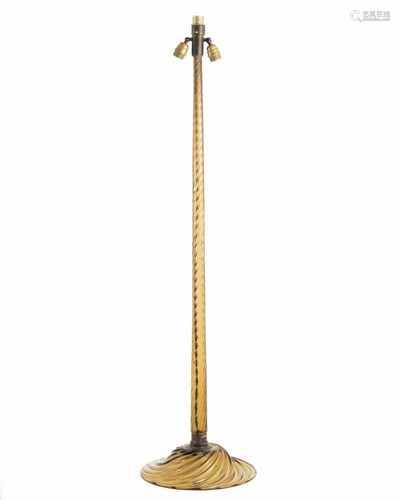 Venini & C., Murano (attr.), Floor lamp, c. 1950Floor lamp, c. 1950H. 156 cm. Amber colored glass in