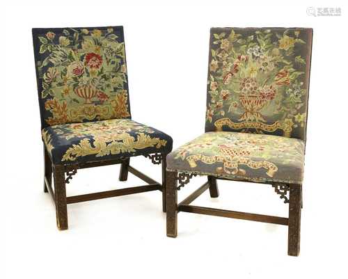 A pair of Chippendale period single library chairs,