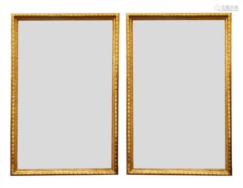 A large pair of carved and gilded picture frames,