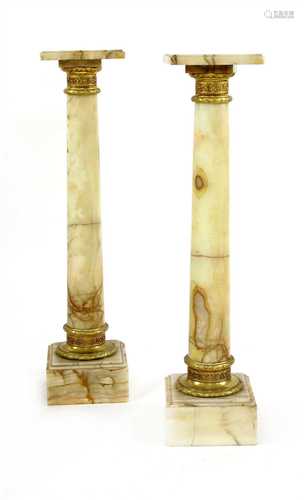 A pair of alabaster columns,