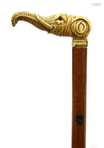 An ivory and malacca walking stick,