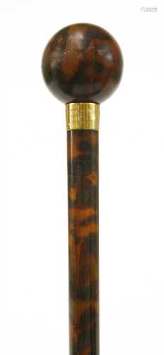 A fine tortoiseshell walking cane by Brigg of London,