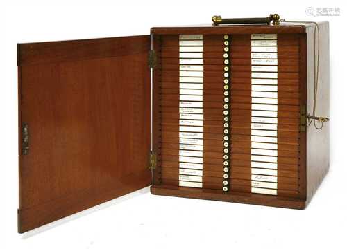 A mahogany cabinet of microscope slides,