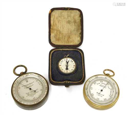 Three pocket barometers/altimeters and silver fob,