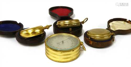 Four pocket barometer/altimeters,