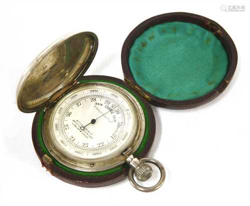 A silver hunter cased barometer/altimeter,