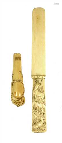 A carved ivory page turner,