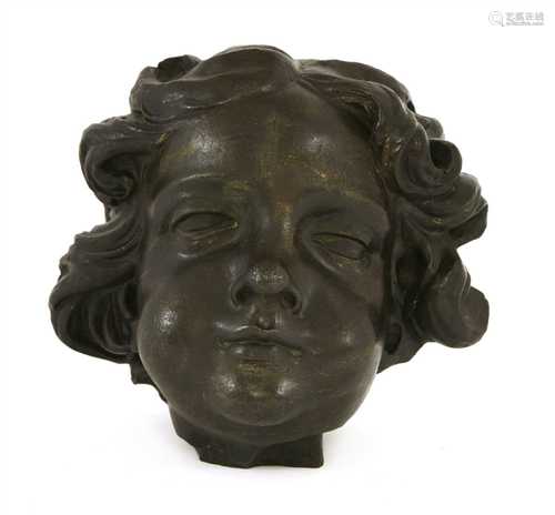 A cast spelter and bronzed head of a Florentine-style boy,