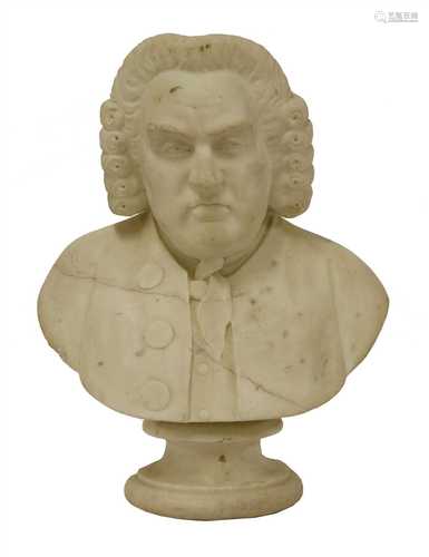 A carved marble bust of a gentleman, possibly Samuel Johnson