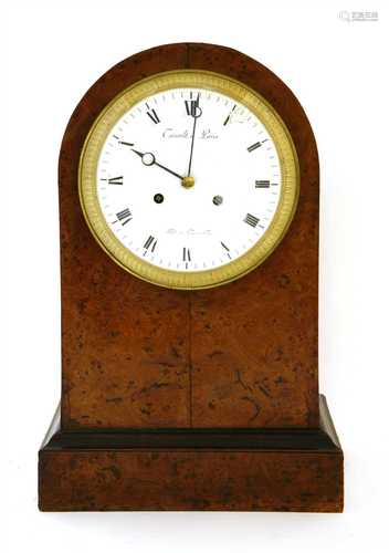 A French amboyna mantel clock,