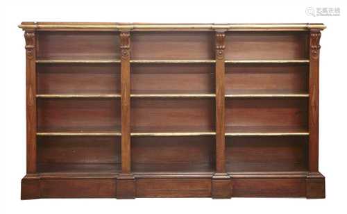 A Victorian oak and parcel-gilt three section open bookcase,