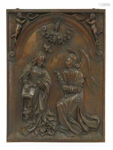 A relief carved panel of The Annunciation,