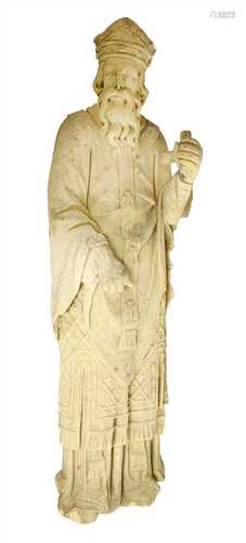 A carved sandstone figure of a saint,