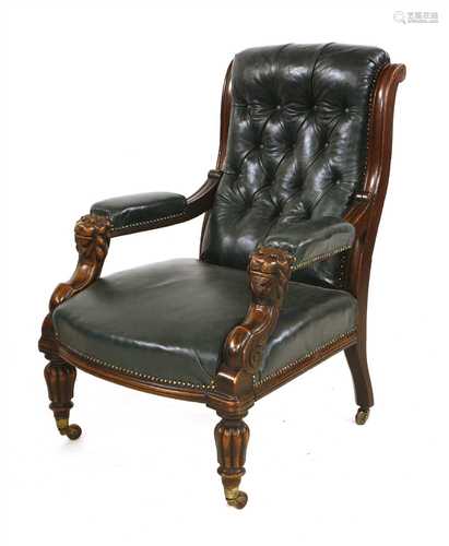 A William IV mahogany and green buttoned leather library chair,