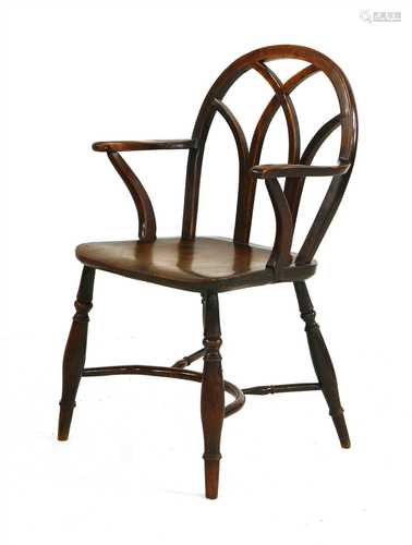 A yew and elm Gothic-type Windsor chair,