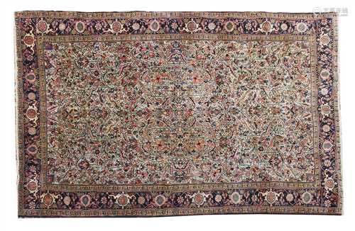 An Heriz carpet,