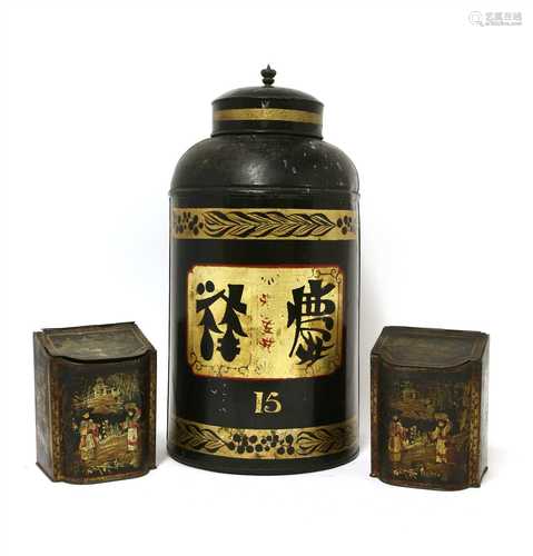 A black-lacquered tin tea canister,