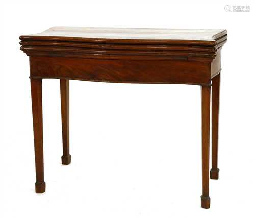 A George III mahogany serpentine-fronted triple fold-over tea and card table,