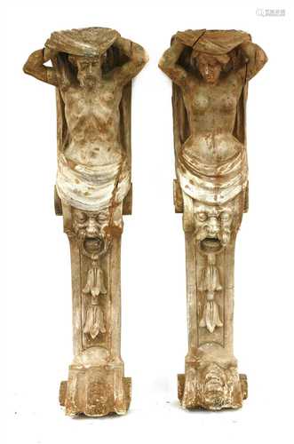 A pair of carved wood caryatid brackets,