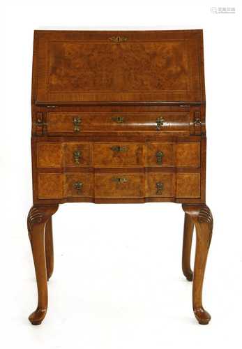 A walnut and crossbanded fall front bureau,