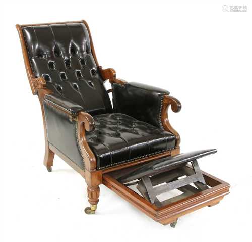 A William IV mahogany and studded leather reclining library armchair,