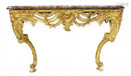 A carved giltwood and marble-topped console table,