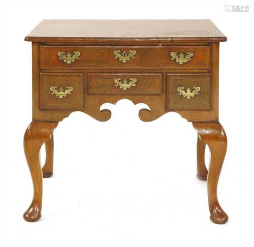 A George II-style walnut lowboy,