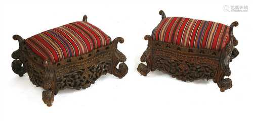 A pair of Indian rosewood footstools,