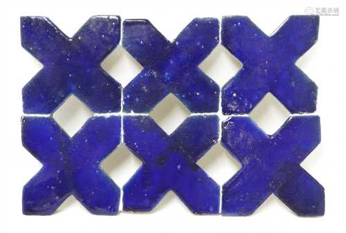 A panel of six pottery cross tiles,