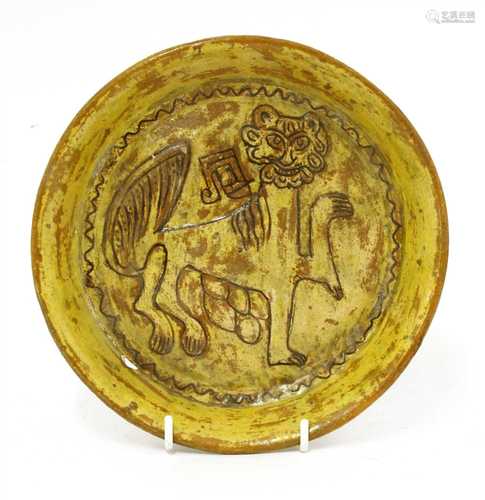 A Fustat Fatimid yellow-glazed sgraffito dish,