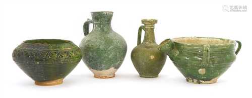 Four Persian green-glazed pottery vessels,