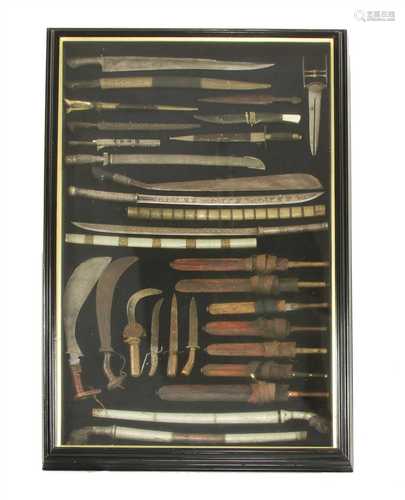 A collection of twenty-eight edged weapons,