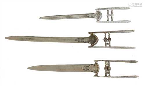 Three steel push daggers (katars)