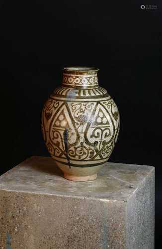 A fragmentary Fatimid lustre pottery jar,