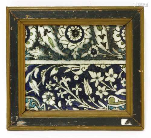 An Isnik pottery tile panel,