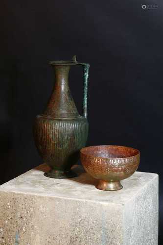 A Persian copper silver-inlaid bowl,