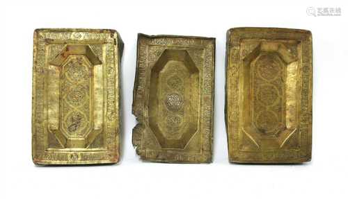 A pair of embossed sheet brass trays,