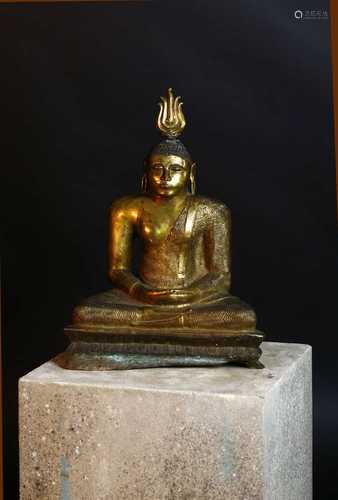 A gilt bronze figure of Buddha,